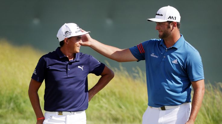 HARTFORD, WI - JUNE 16:  Rickie Fowler of the United State (L) and Jon Rahm of Spain meet on the tenth green during the second round of the 2017 U.S. Open 