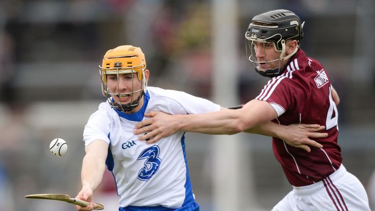 Tommy Ryan of Waterford in action against Aidan Harte of Galway