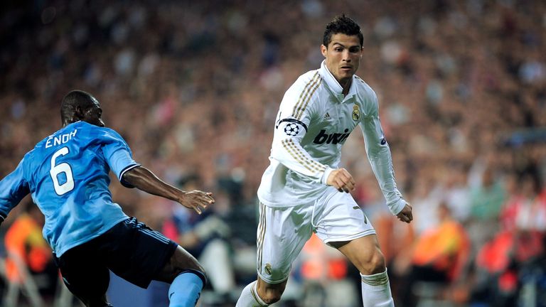 Cristiano Ronaldo of Real Madrid beats Eyong Enoh of AFC Ajax during the UEFA Champions League Group D match in 2011