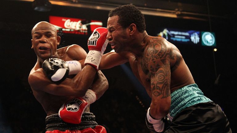 LAS VEGAS - MAY 01:  (R-L) Shane Mosley throws a right to the head of Floyd Mayweather Jr. during the welterweight fight at the MGM Grand Garden Arena on M