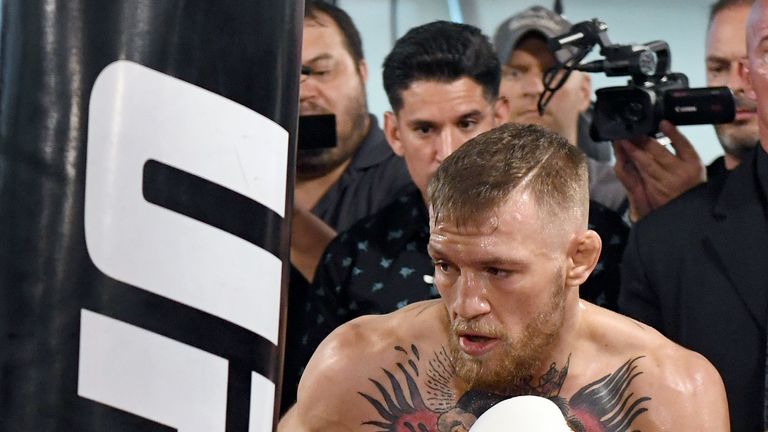 LAS VEGAS, NV - AUGUST 11:  UFC lightweight champion Conor McGregor hits a heavy bag during a media workout at the UFC Performance Institute on August 11, 
