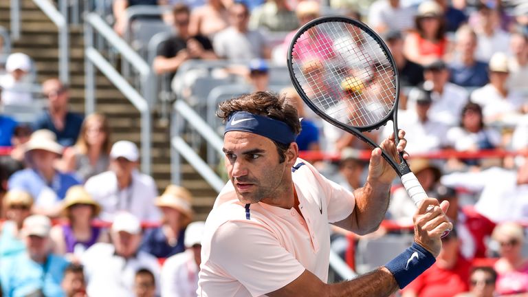 MONTREAL, QC - AUGUST 09:  Roger Federer of Switzerland prepares to return the ball against Peter Polansky of Canada during day six of the Rogers Cup prese