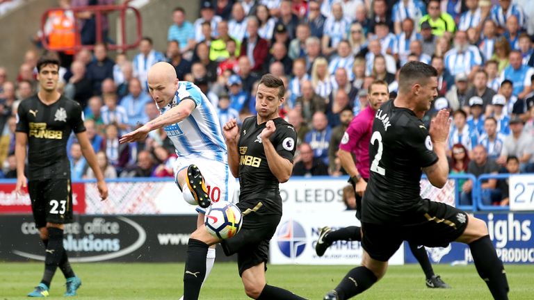HUDDERSFIELD, ENGLAND - AUGUST 20: Aaron Mooy of Huddersfield Town scores his sides first goal during the Premier League match between Huddersfield Town an