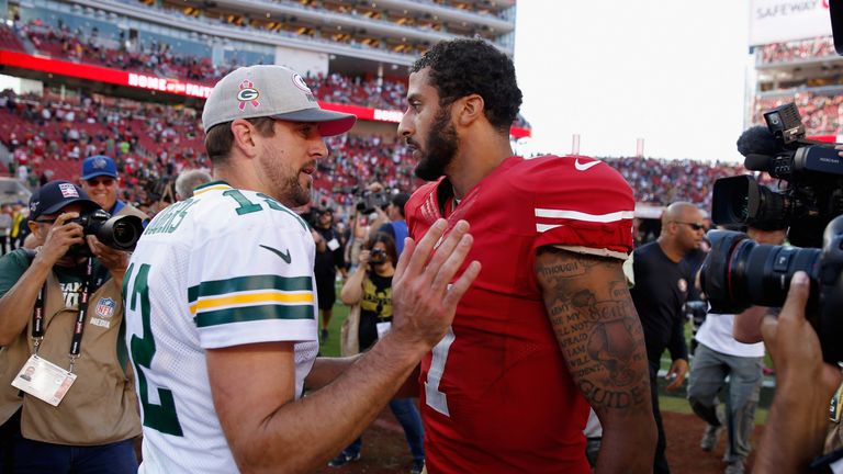 SANTA CLARA, CA - OCTOBER 04:  Colin Kaepernick #7 of the San Francisco 49ers talks with Aaron Rodgers #12 of the Green Bay Packers after their game at Lev