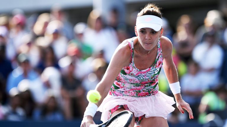 Poland's Agnieszka Radwanska returns the ball to Petra Martic of Croatia during their 2017 US Open Women's Singles match at the USTA Billie Jean King Natio