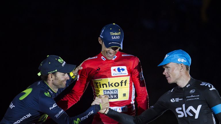 Winner Tinkoff's Spanish cyclist Alberto Contador (C), second-placed SKY's British cyclist Christopher Froome