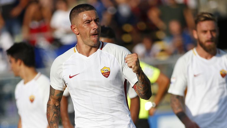 AS Roma's Serbian defender Aleksandar Kolarov (L) celebrates after scoring a goal during the Italian Serie A football matchbetween Atalanta and AS Roma on 