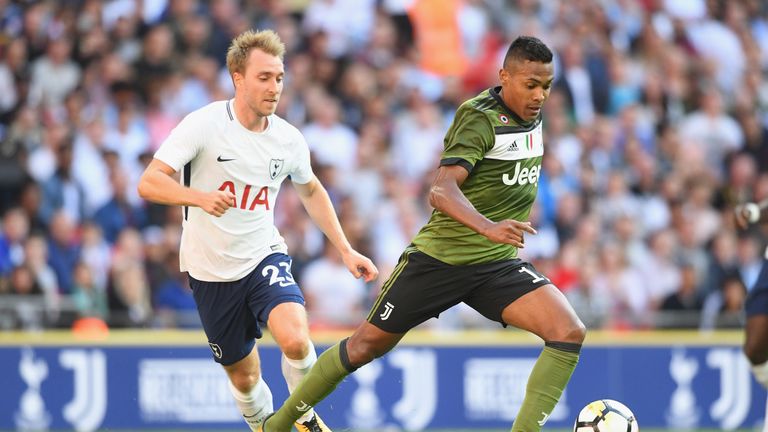 LONDON, ENGLAND - AUGUST 05: Christian Eriksen of Spurs and Alex Sandro Lobo Silva of Juventus in action during the pre-season match between Tottenham Hots