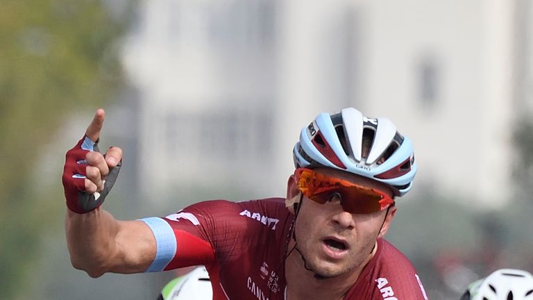 Norwegian Alexander Kristoff, from Team Katusha Alpecin, raises his arm at the finish line of the 4th stage of the cycling Tour of Oman between al-Sifah an
