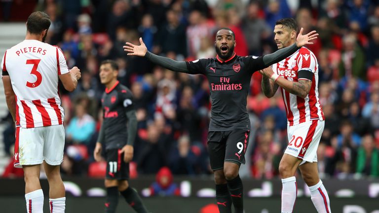 STOKE ON TRENT, ENGLAND - AUGUST 19:  Alexandre Lacazette of Arsenal reacts to having his goal rulled for offisde during the Premier League match between S