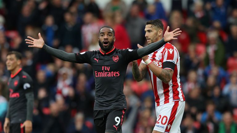 STOKE ON TRENT, ENGLAND - AUGUST 19:  Alexandre Lacazette of Arsenal appeals to the referee after his goal was disallowed during the Premier League match b