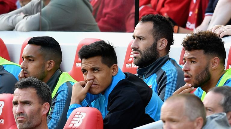 LIVERPOOL, ENGLAND - AUGUST 27: Alexis Sanchez of Arsenal looks on from the bench during the Premier League match between Liverpool and Arsenal at Anfield 