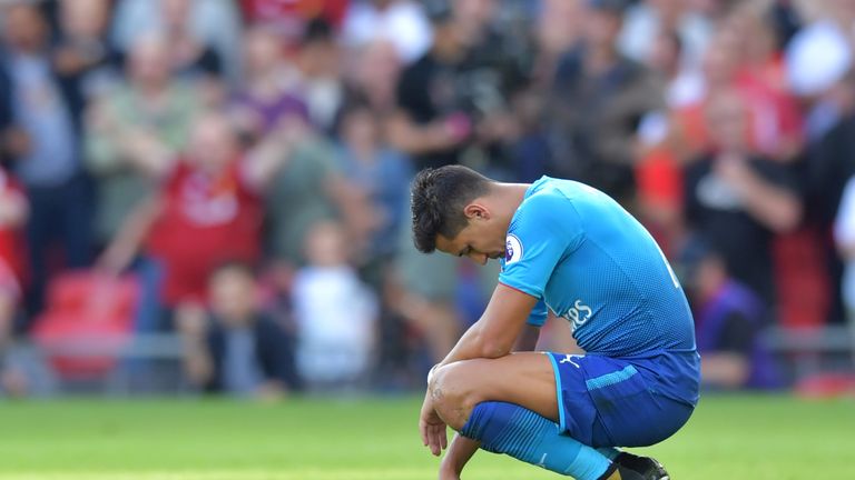 Arsenal's Chilean striker Alexis Sanchez reacts during the English Premier League football match between Liverpool and Arsenal at Anfield in Liverpool, nor