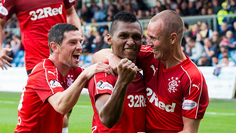 Alfredo Morelos (centre) celebrates making it 2-0 with Kenny Miller