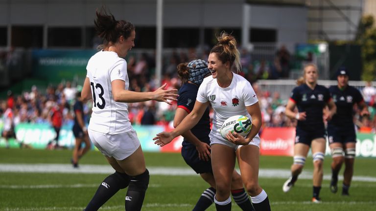DUBLIN, IRELAND - AUGUST 17:  Amy Wilson Hardy (R) celebrates with Emily Scarratt of England after scoring a try during the Women's Rugby World Cup Pool B 