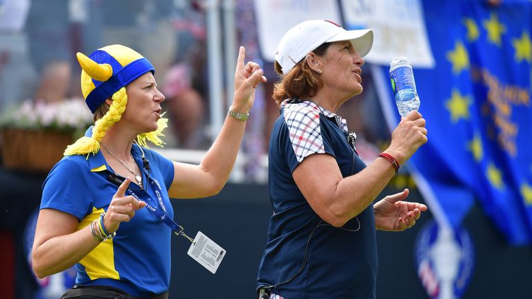 WEST DES MOINES, IA - AUGUST 20:  Annika Sorenstam, Captain of Team Europe dances with Juli Inkster, Captain of Team USA on the first tee during the final 