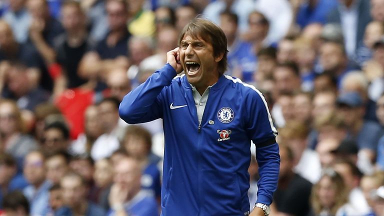 Chelsea's Italian head coach Antonio Conte gestures on the sideline during the FA Community Shield football match between Arsenal and Chelsea at Wembley St