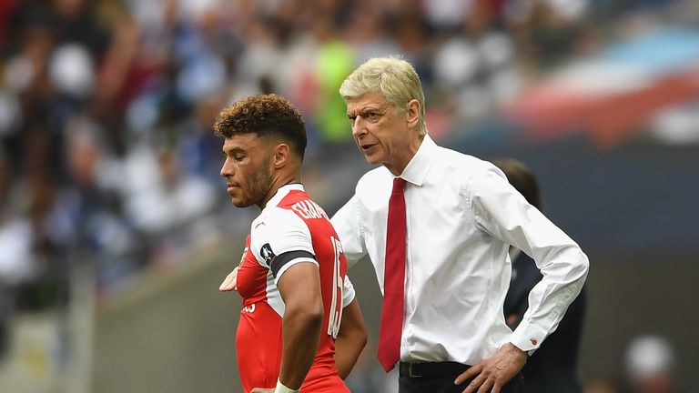 Arsene Wenger, Manager of Arsenal speaks to Alex Oxlade-Chamberlain of Arsenal during The Emirates FA Cup Final 