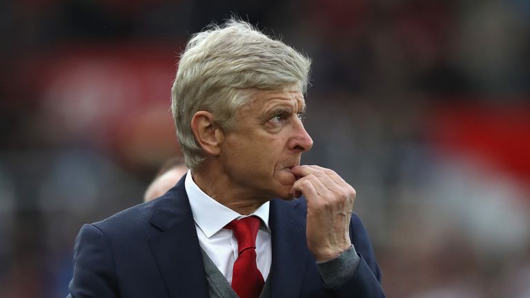 STOKE ON TRENT, ENGLAND - AUGUST 19:  Arsene Wenger, the Arsenal manager looks dejected after their defeat during the Premier League match between Stoke Ci
