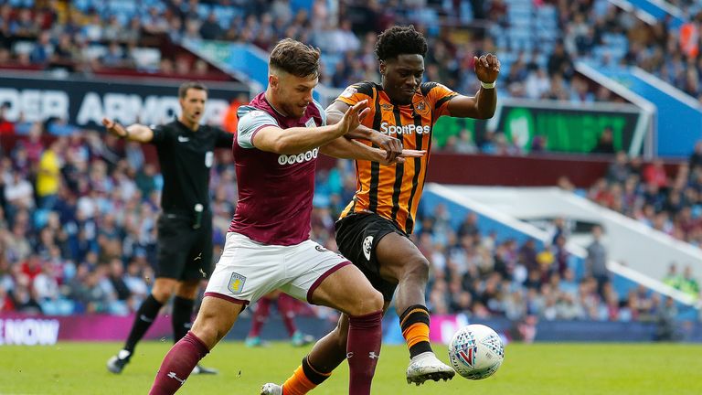 Scott Hogan in action with Ola Aina during the Sky Bet Championship match at Villa Park