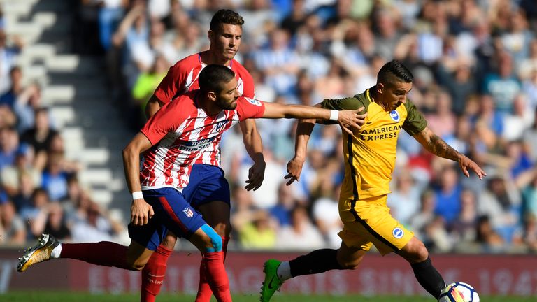 BRIGHTON, ENGLAND - AUGUST 06:  Anthony Knockaert of Brighton is challenged by Yannick Carrasco of Atletico Madrid during a Pre Season Friendly between Bri
