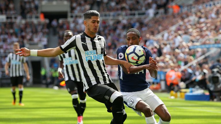 Ayoze Perez and Kyle Walker-Peters challenge for the ball