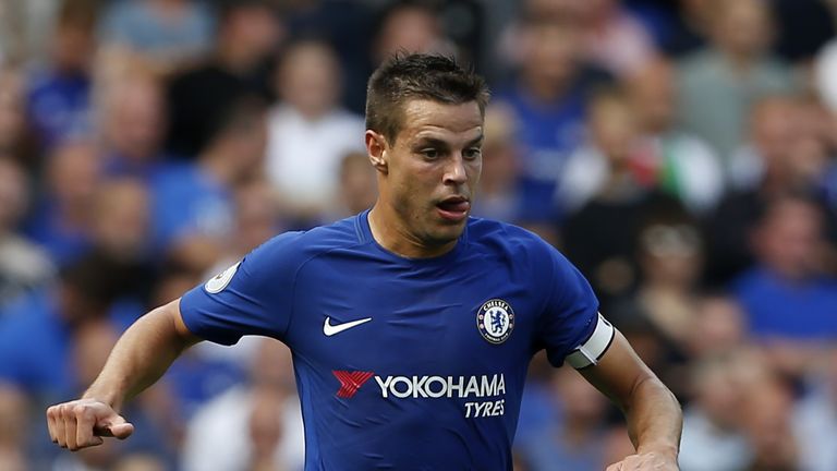 Chelsea's Spanish defender Cesar Azpilicueta runs with the ball during the English Premier League football match between Chelsea and Burnley