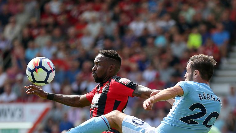 Jermain Defoe and Bernado Silva battle for the ball at the Vitality Stadium