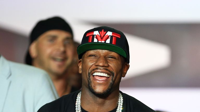 Floyd Mayweather Jr. laughs during the Floyd Mayweather Jr. v Conor McGregor World Press Tour at Budweiser Stage on July 12, 2017 i
