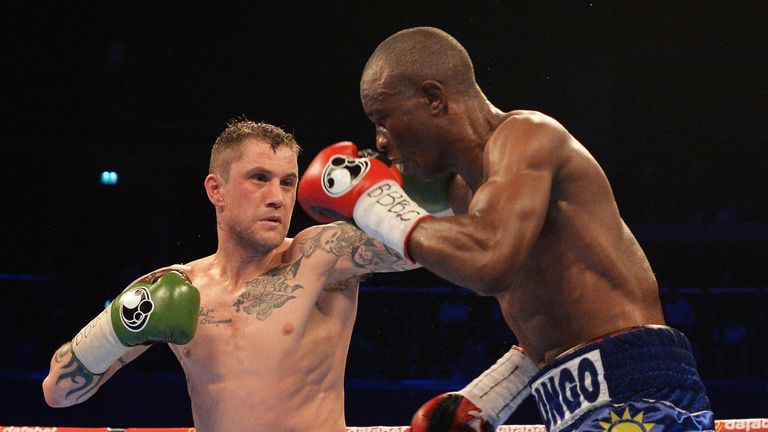 Ricky Burn takes on Julius Indongo during the World Super-Lightweight unification bout in Glasgow