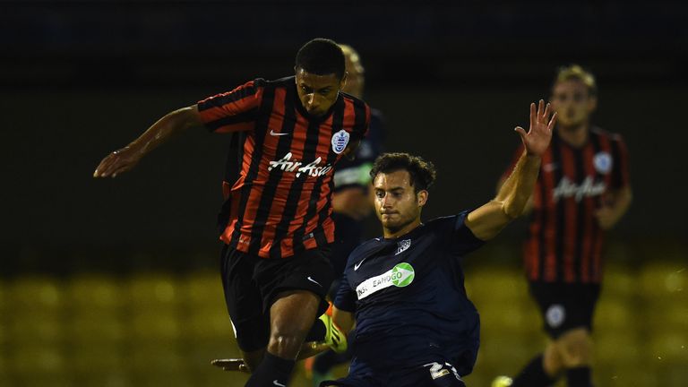 SOUTHEND, ENGLAND - JULY 30:  Brandon Comley of QPR gets away from Ross Jenkins of Southend during the Pre-Season friendly match between Southend United an