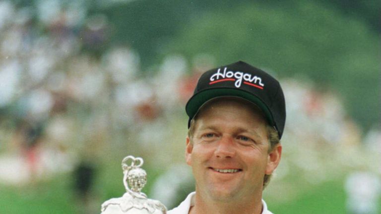 Mark Brooks of the USA celebrates with the trophy after victory in a playoff in the US PGA Championships at the Valhalla Golf Club, Louisvill