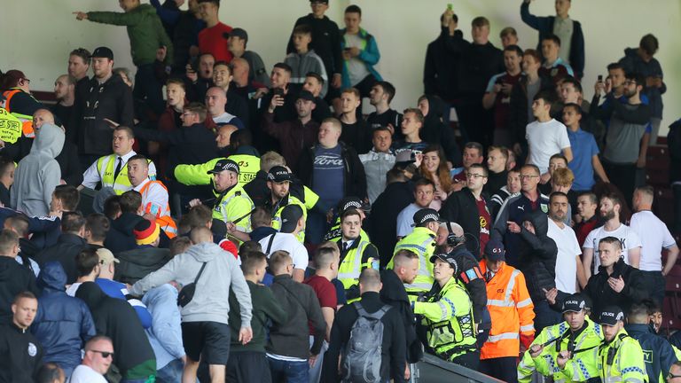 Hannover 96 and Burnley fans are seperated by police in the stands during the pre-season friendly match at Turf Moor, Burnley.