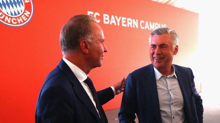 Carlo Ancelotti talks to Karl-Heinz Rummenigge 