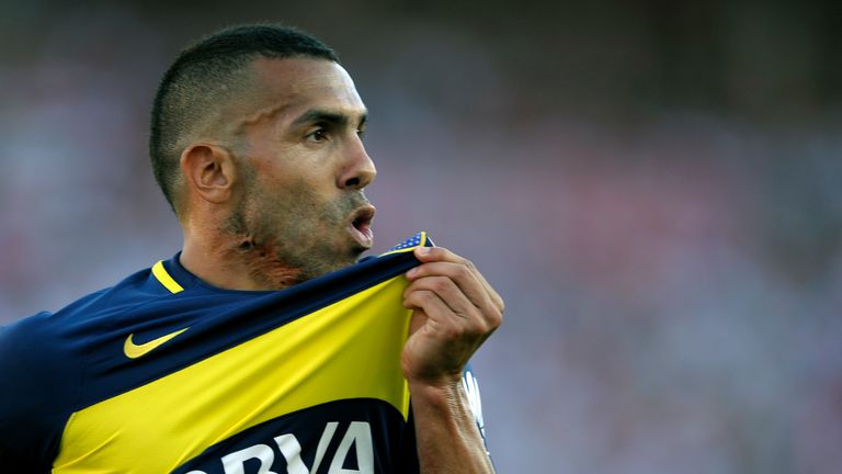Boca Juniors' forward Carlos Tevez celebrates after scoring the team's second goal against River Plate during their Argentina First Division football match
