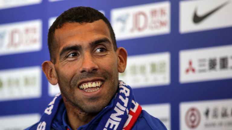 Argentine striker Carlos Tevez smiles during a press conference in Shanghai on January 21, 2017.
Tevez held his first press conference for his new club Sha