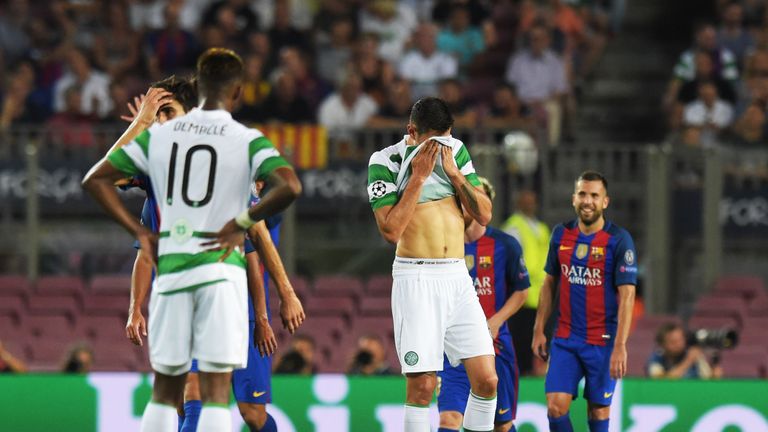 Celtic's Nir Bitton cuts a dejected figure after Celtic's defeat to Barcelona at the Nou Camp  last season.