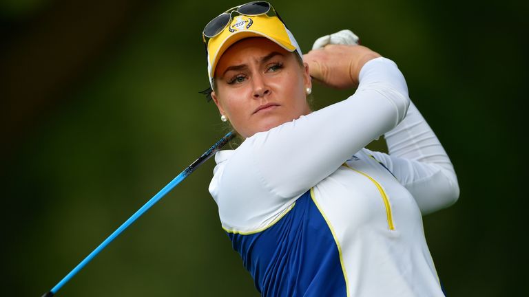 Charley Hull of Team Europe plays a shot during the morning foursomes matches of the Solheim Cup 