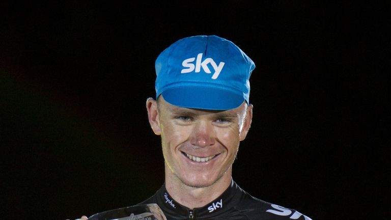 Second-placed SKY's British cyclist Christopher Froome poses on the podium of the 69th edition of "La Vuelta" Tour of Spain, a 9,7 km individual time trial