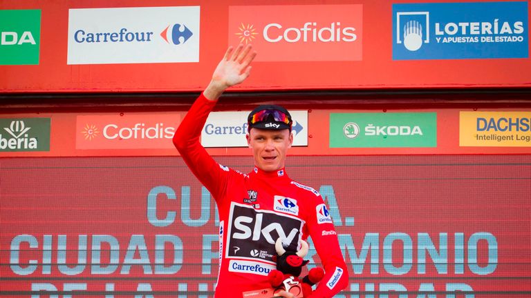 Sky's British cyclist Chris Froome celebrates his Red Jersey on the podium of the 7th stage of the 72nd edition of "La Vuelta" Tour of Spain cycling race, 