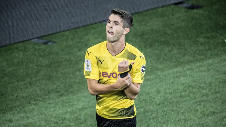 Christian Pulisic of Dortmund celebrates his team's first goal during the DFL Supercup 2017 match between Borussia Dortmund  and Bayern Muenchen at Signal 