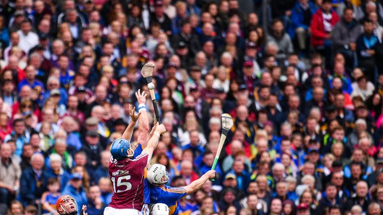 Conor Cooney in action against Ronan Maher of Tipperary 