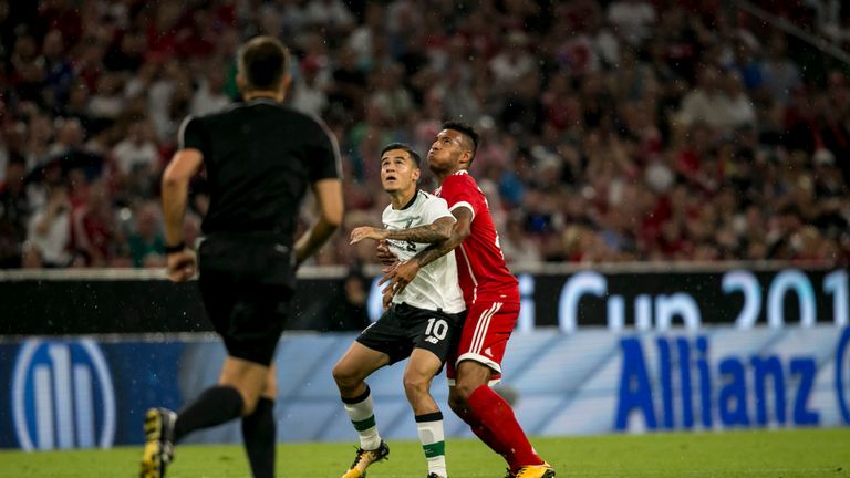 Philippe Coutinho of FC Liverpool and Corentin Tolisso of FC Bayern Muenchen  fight for the ball during the Audi Cup 2017 matc