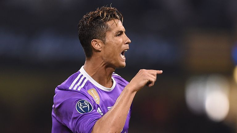 Real Madrid's Portuguese striker Cristiano Ronaldo celebrates after scoring during the UEFA Champions League final football match between Juventus and Real