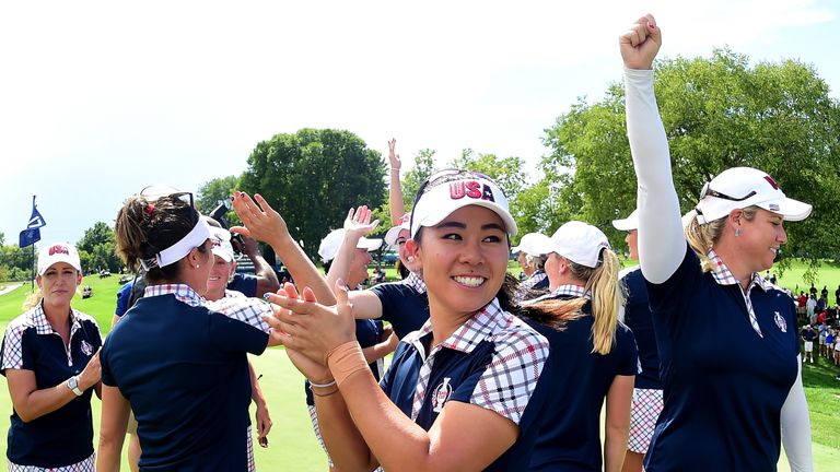 WEST DES MOINES, IA - AUGUST 20:  Danielle Kang of Team USA celebrates victory over Team Europe during the final day singles matches of the Solheim Cup at 