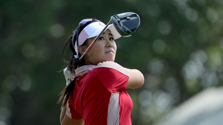 Danielle Kang of the United States Team Team plays her tee shot 
