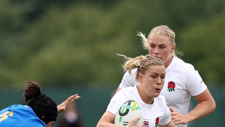 DUBLIN, IRELAND - AUGUST 13:  Danielle Waterman of England is tackled by Ilaria Arrighetti of Italy during the Women's Rugby World Cup 2017 between England