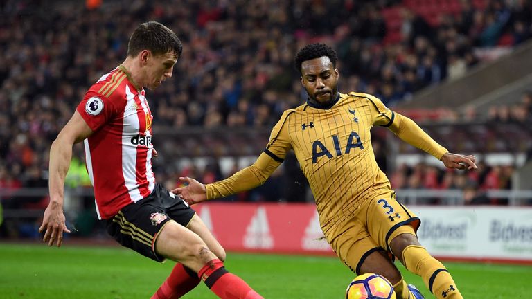 Danny Rose of Tottenham Hotspur and Billy Jones of Sunderland compete for the ball during the Premier League match