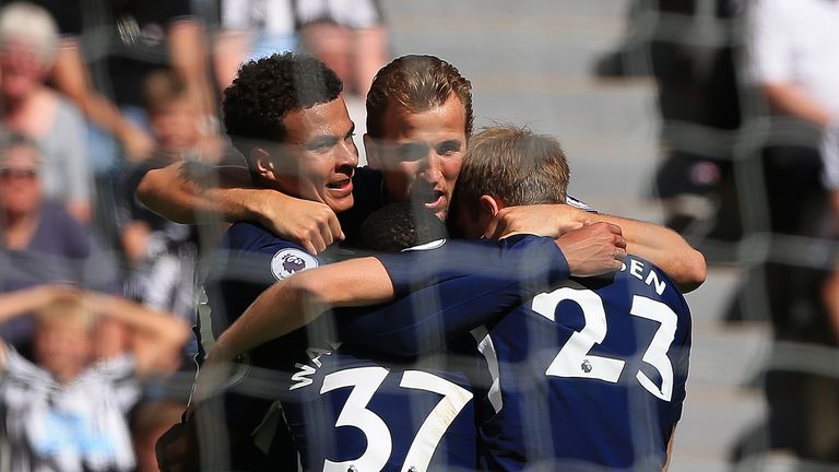 Dele Alli celebrates scoring the opening goal of the game with his Tottenham team-mates