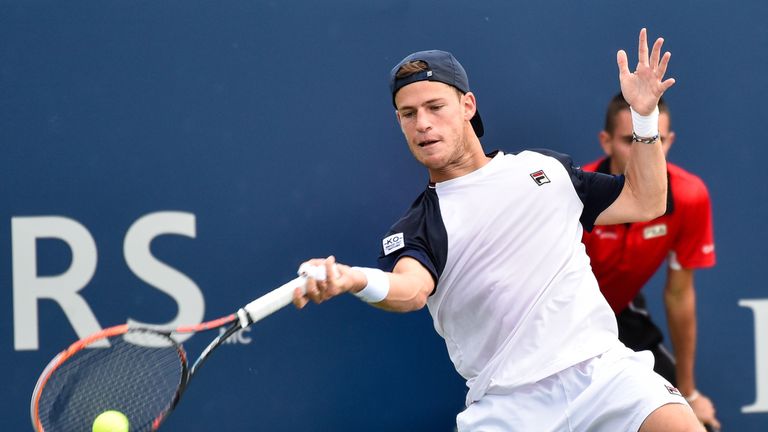 MONTREAL, QC - AUGUST 07:  Diego Schwartzman of Argentina hits a return shot against Reilly Opelka of the United States during day four of the Rogers Cup p